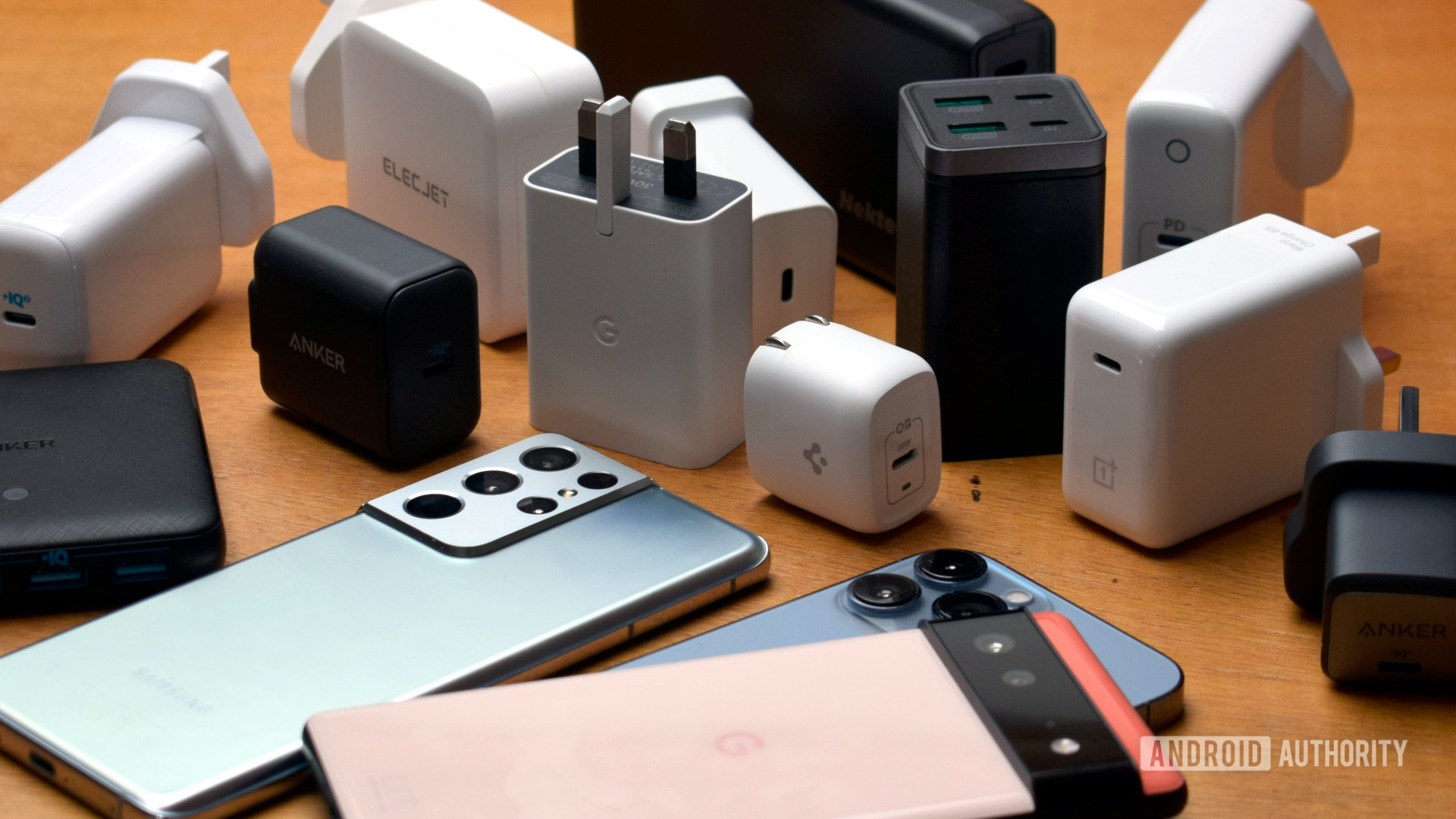 Galaxy Iphone And Pixel Smartphones With A Selection Of Chargers