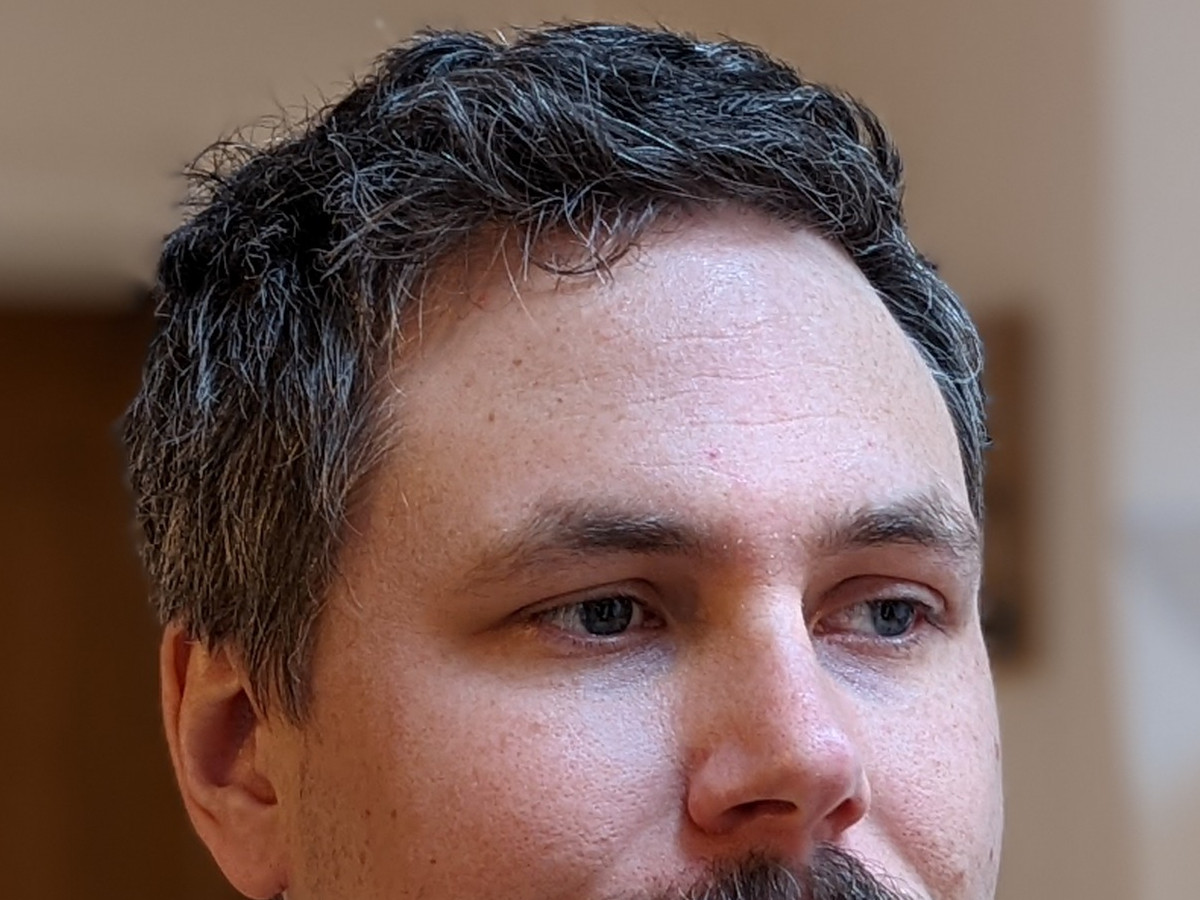 Google Pixel 6 Pro portrait crop of a man's face with dark hair