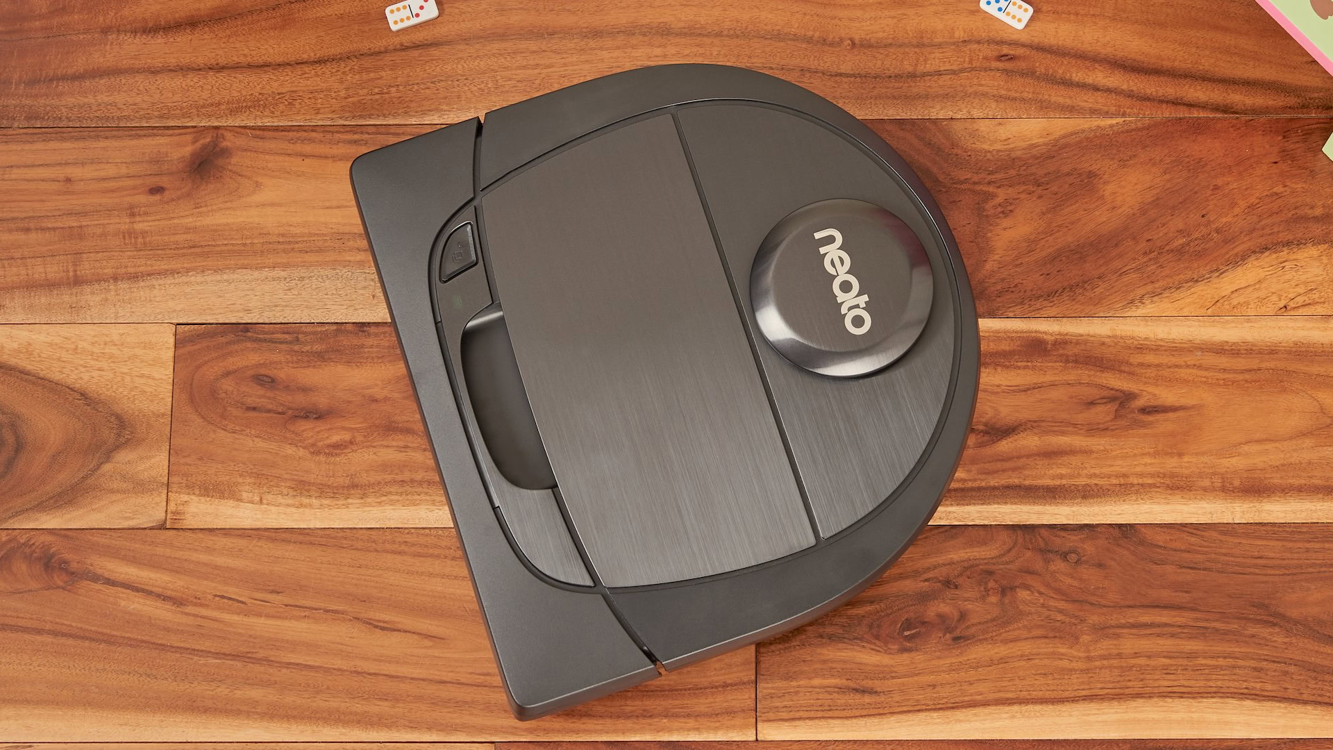 Neatos Botvac D6 vacuum cleaner on hardwood.  Smart Home Black Friday Deals.