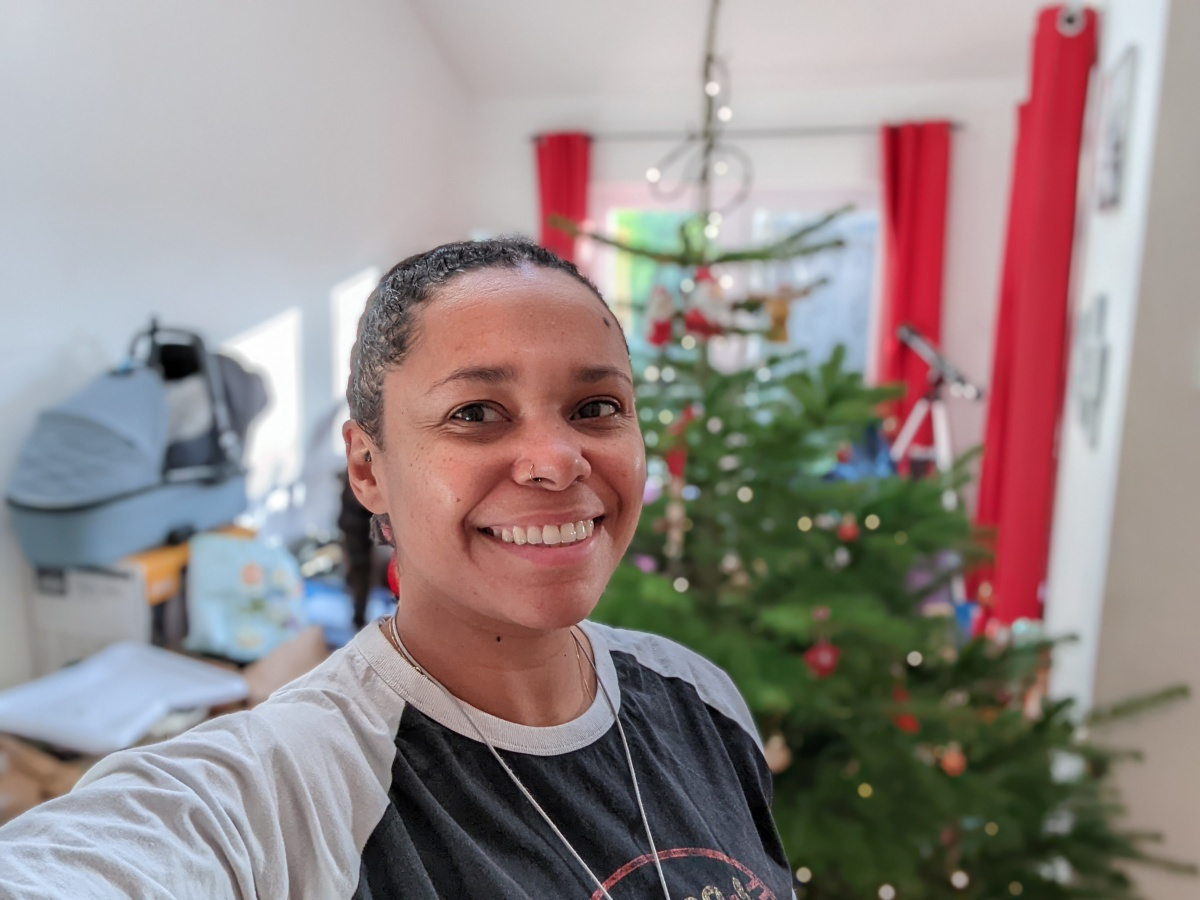 Selfie indoors with xmas tree in the background shot on Google Pixel 6 Pro