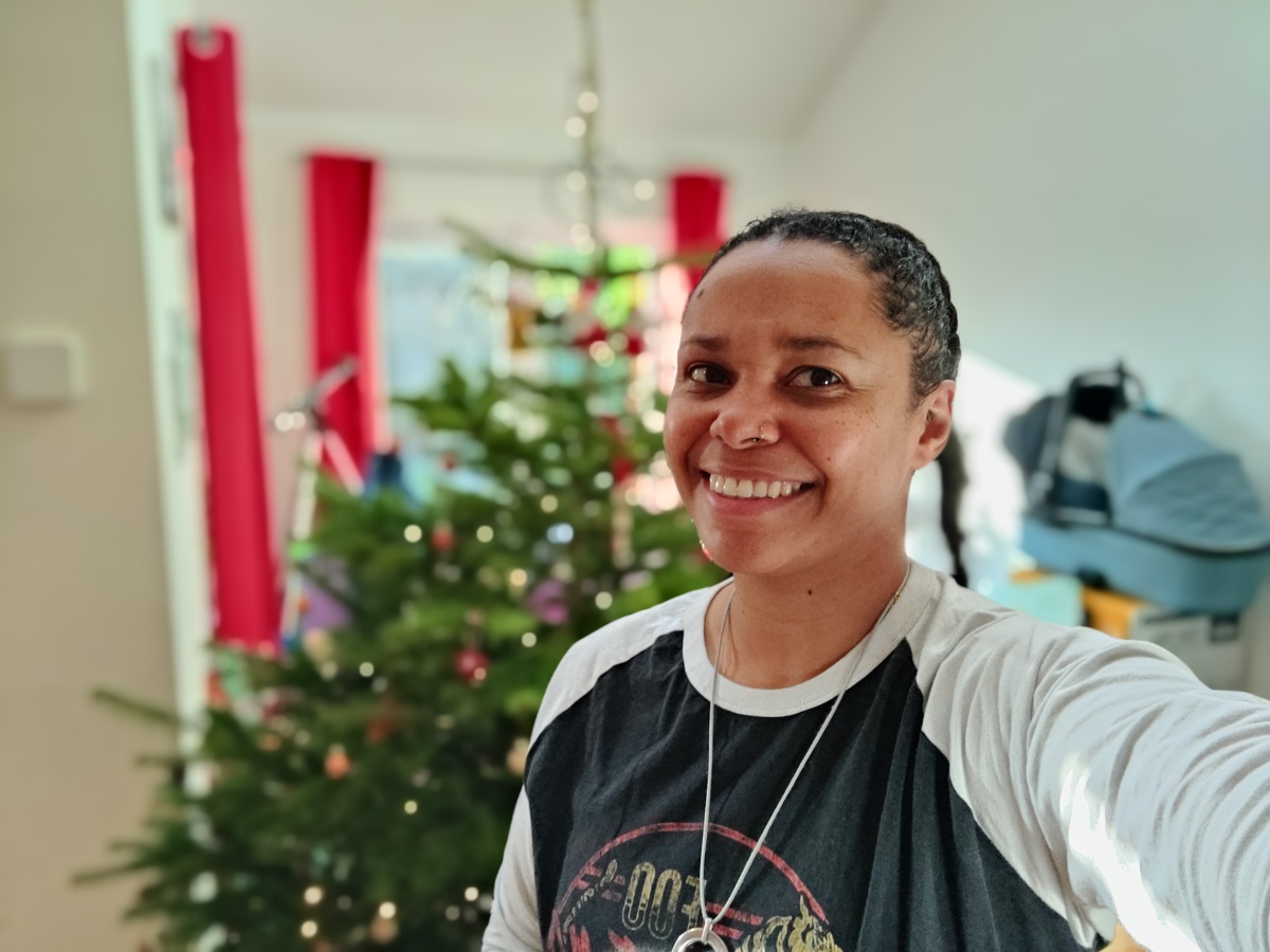 Selfie indoors with xmas tree in the background shot on OnePlus 9 Pro