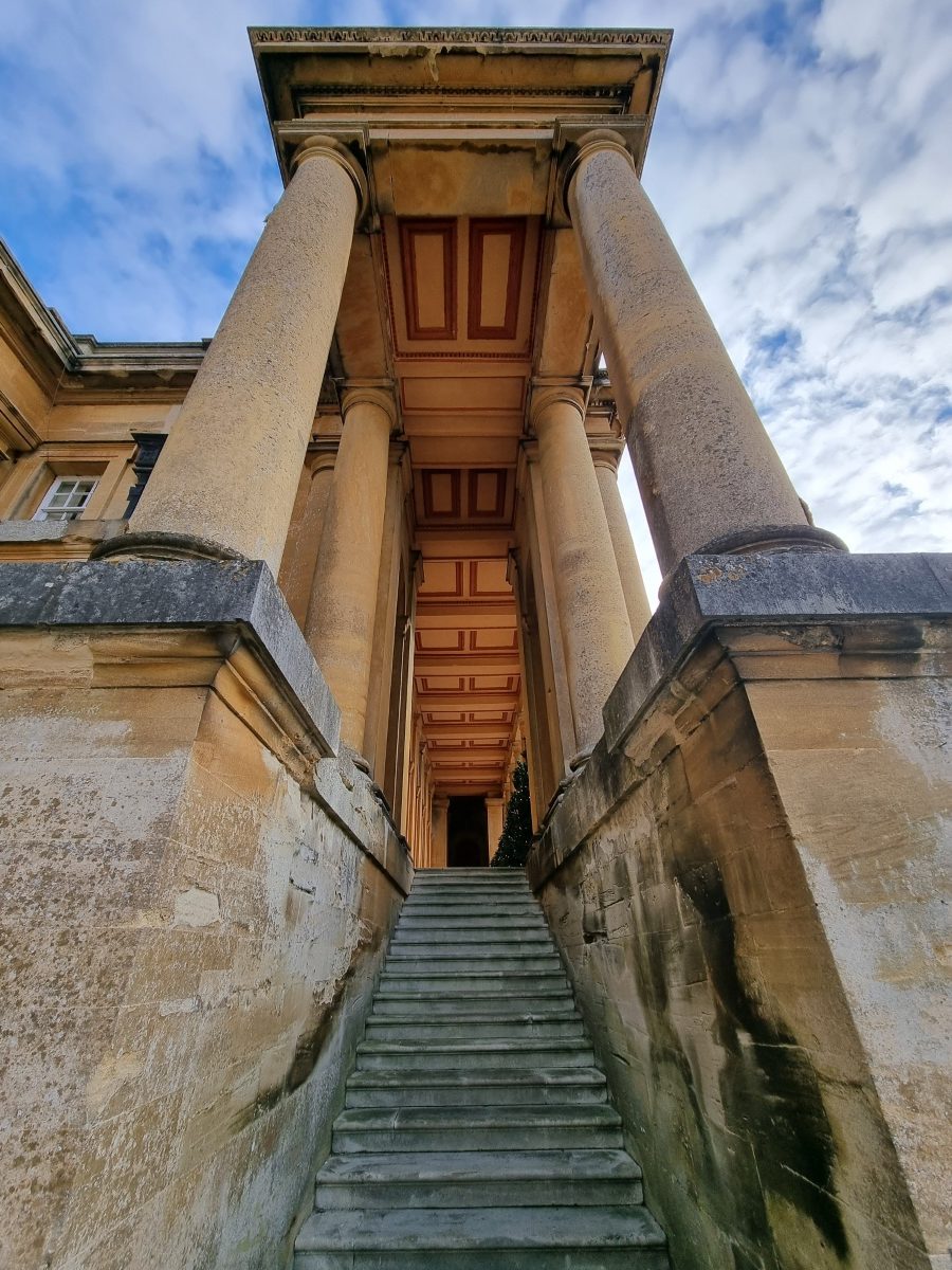 Wide-angle picture of stone pillars and stairs on a cloudy blue sky shot on Samsung Galaxy S21 Ultra