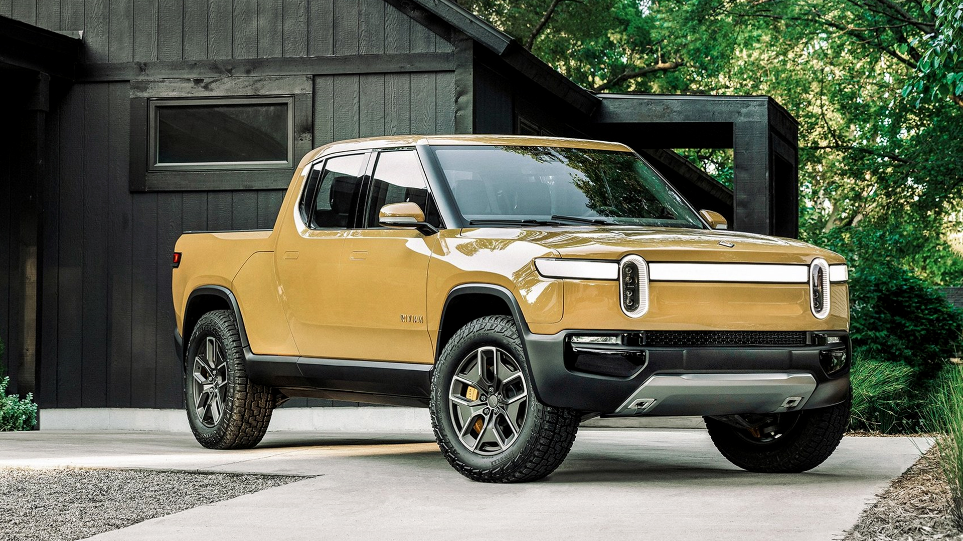 A Rivian R1T electric truck in yellow