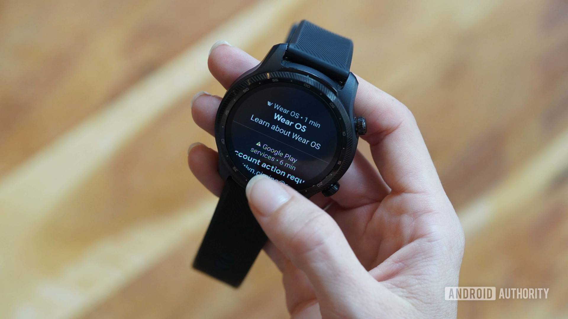 A user reviews a notification about the Wear OS tutorial on her TicWatch Pro 3 Ultra.