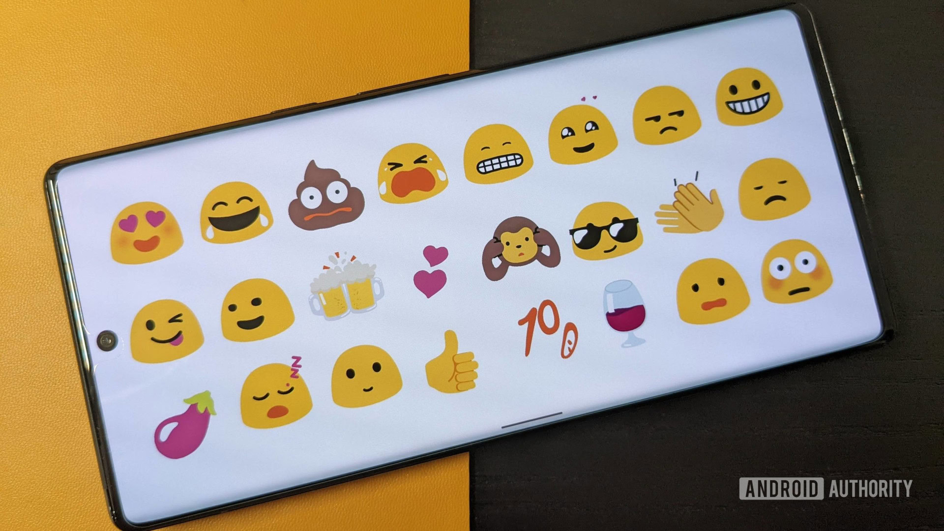 Pack d'autocollants emoji Blob sur un Pixel 6 avec un fond jaune et noir